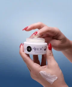 Applying Glimore Lifting Cream on the hand